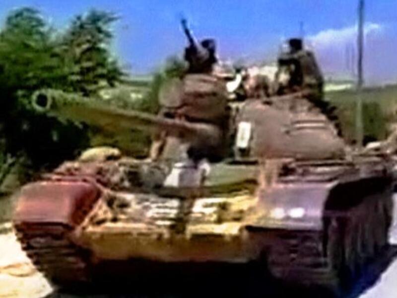 Regime tanks pound Latakia & Homs operating a shoot-to-kill policy: Syrian Khaled al-Hamed is shot & run over 
by a tank. Rolling out his murderous agenda for 'dealing' with his uprising- or flattening it- Al-Assad reminds us of Israeli nearly-indicted war Criminal Ariel Sharon, 'Bulldozer', for his predilection for clearing Palestinians off land.