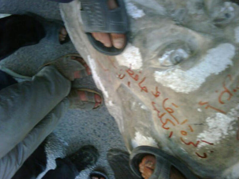 Hafez al-Assad falls in Darra: Protesters haul down a statue of President Assad's father, late president Hafez al-Assad, before security forces open fire from buildings.