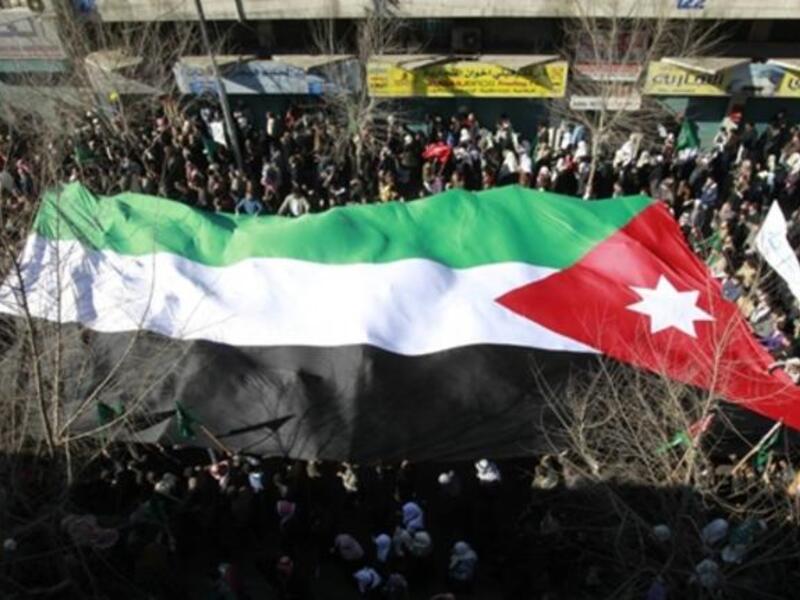 JORDAN: Thousands of Jordanian demonstrators attend a protest against Jordan's economic policies, demanding "bread and freedom" and that the government resign, January 21, 2011.
