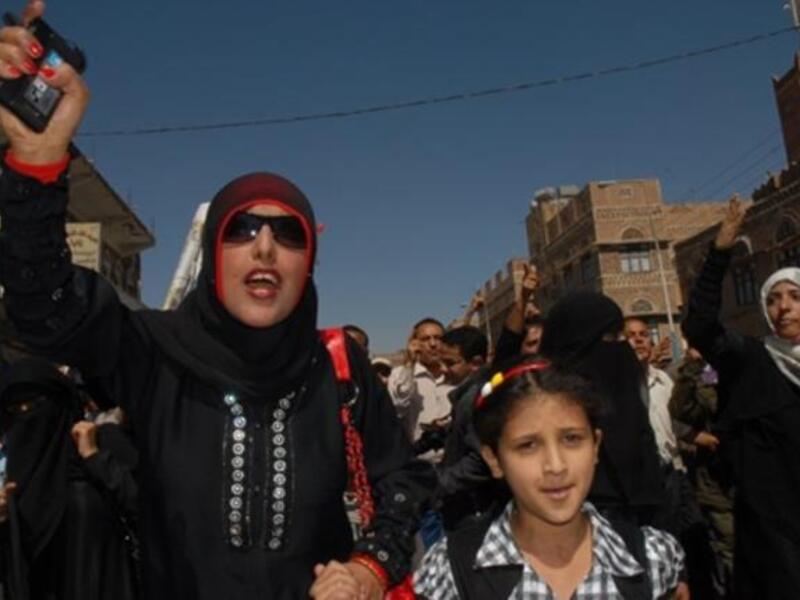Tawakel Karman (R), who heads a rights group, joins a protest calling for the ouster of Yemen's President Ali Abdullah Saleh.