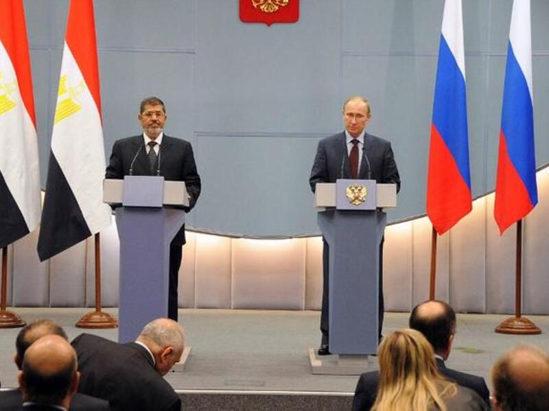 Morsi with Putin in Russia