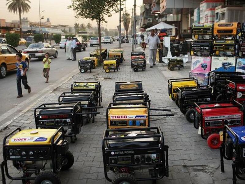 An Iraqi street lined with power generators