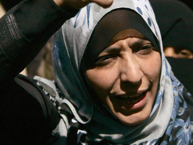 Tawakkul Karman- Yemen's revolutionary extraordinaire rose to public acclaim for her contributions to
both Arab women-kind and the Arab Spring. While sharing the Nobel Peace Prize with 3 women, this didn't 
diminish the scale of the victory for a buzzing Arab population - proud for one of theirs to join the select space
of 12 females before her.