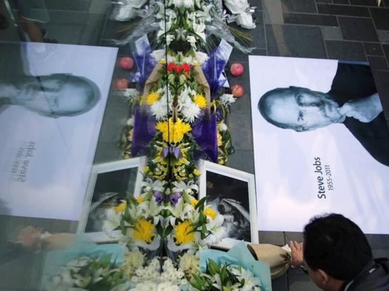 A scene capturing the Chinese emotional and heightened reaction: His mass following saw global aficionados, from China to the UAE - including Dubai that today has become a 'Mecca' to the Apple products. 