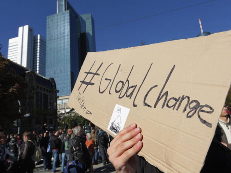 "Global change": This was the rallying cry for much of the Globe this weekend passed.  Speakers such as Ronald Regan, the 
former actor-President of the US participated. Most fittingly, the Marxist, en-vogue, philosopher-dissident Slavoj Žižek
gave an inspiring address to a world ripe for an alternative system. One that rejected Capitalism. 