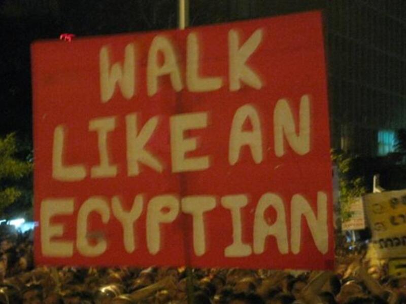 Inspired by the Arab way: What broke out in Sidi Bouzid- an economically-fueled incident involving a stall trader-  
has now caught like the plague. Posters directly allude to the source of confidence drawn from the Arab Spring. 
The battle of the 'haves' & 'have-nots' - in terms of power or of wealth-  lie at the heart of these revolutions.