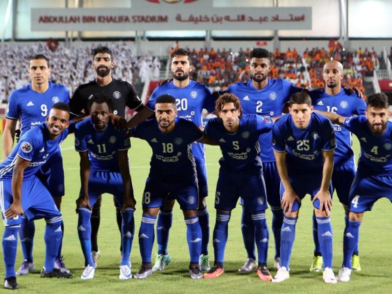 Al-Nasr's starting eleven pose for a group picture during the Asian Champions League quarter-final football match between Qatar's El-Jaish and UAE's Al-Nasr at Abdullah Bin Khalifa Stadium in Doha on August 24, 2016.

KARIM JAAFAR / AFP