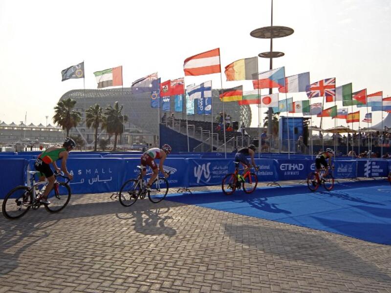 Athletes compete in the ITU World Triathlon at the Yas Marina Circuit in Abu Dhabi on March 4, 2017.
NEZAR BALOUT / AFP