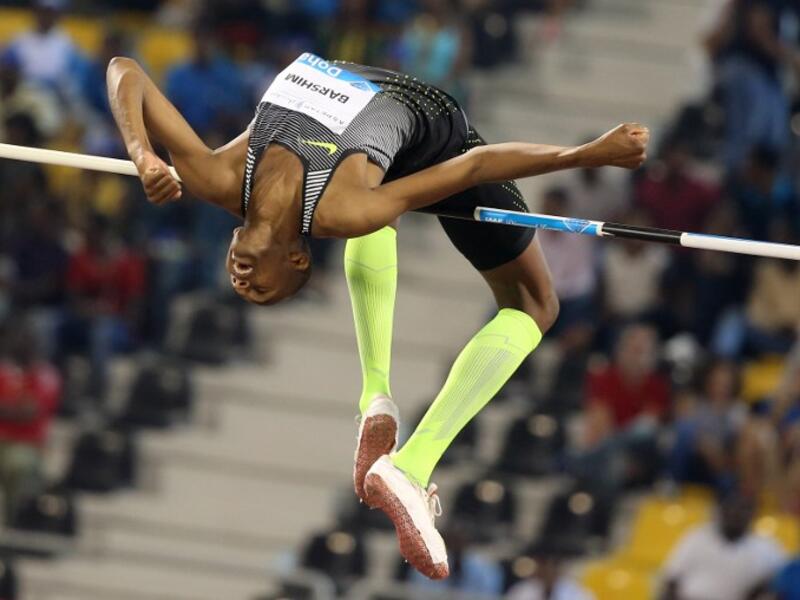 Qatar's Mutaz Essa Barshim competes in the High Jump final event at the Diamond League athletics meeting at the Suhaim bin Hamad Stadium in Doha on May 6, 2016.
KARIM JAAFAR / AFP