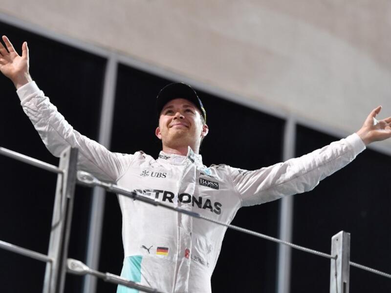 Mercedes AMG Petronas F1 Team's German driver Nico Rosberg celebrates at the end of the Abu Dhabi Formula One Grand Prix at the Yas Marina circuit on November 27, 2016. Nico Rosberg won his maiden Formula One world title by securing second place behind his Mercedes arch-rival Lewis Hamilton in the Abu Dhabi Grand Prix.
Andrej ISAKOVIC / AFP