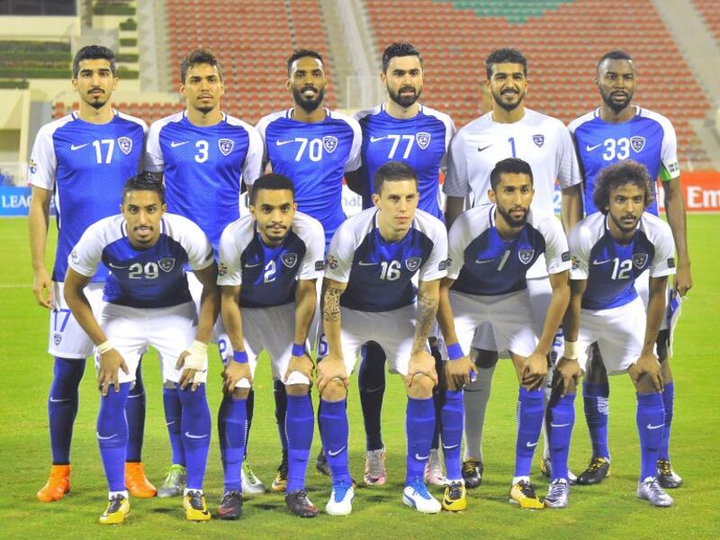 Al-Hilal's starting eleven pose for a group shot ahead of the Asian Champions League semi-final football match between Persepolis and Al-Hilal at the Sultan Qaboos Sports Complex in Muscat on October 17, 2017.
STRINGER / AFP