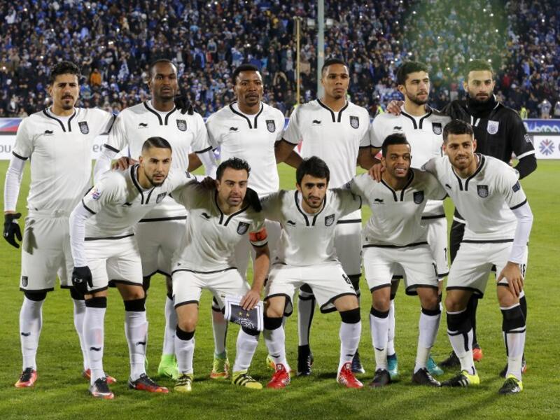 Qatar's Al-Sadd starting eleven pose for a team photo prior to their AFC Champions League playoff football match against Iran's Esteghlal club at the Azadi stadium in Tehran on February 7, 2017.
ATTA KENARE / AFP