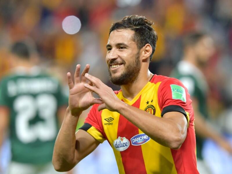 ES Tunis' forward Mohammed Youcef Belaili (R) celebrates after scoring a penalty kick during the fifth place match of the FIFA Club World Cup 2018 football tournament between Tunisia's Esperance Tunis and CD Guadalajara at the Hazza Bin Zayed Stadium in Abu Dhabi, the capital of the United Arab Emirates, on December 18, 2018.
Giuseppe CACACE / AFP