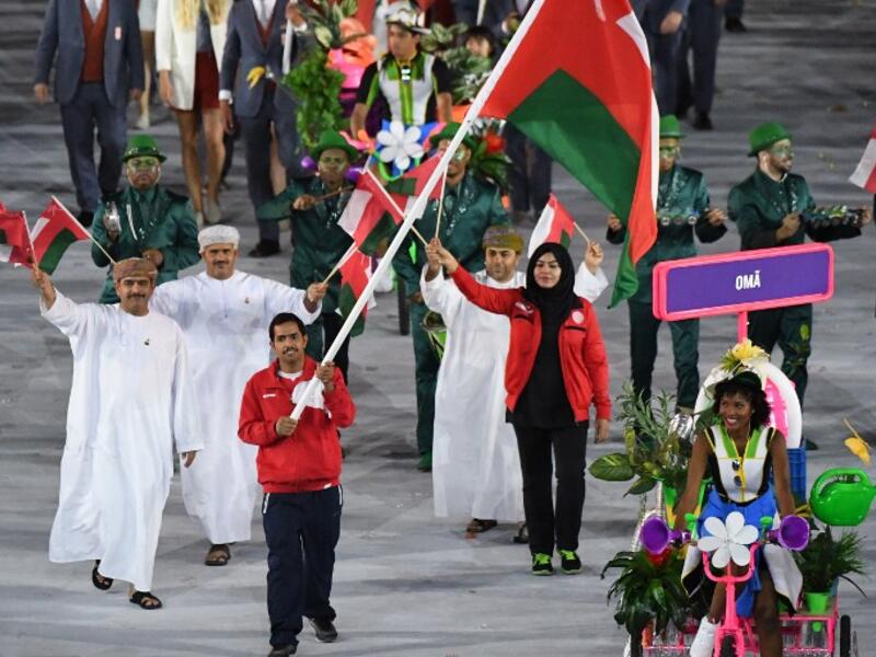 Oman's flagbearer Hamed al-Khatri leads his delegation during the opening ceremony of the Rio 2016 Olympic Games at the Maracana stadium in Rio de Janeiro on August 5, 2016. PEDRO UGARTE / AFP