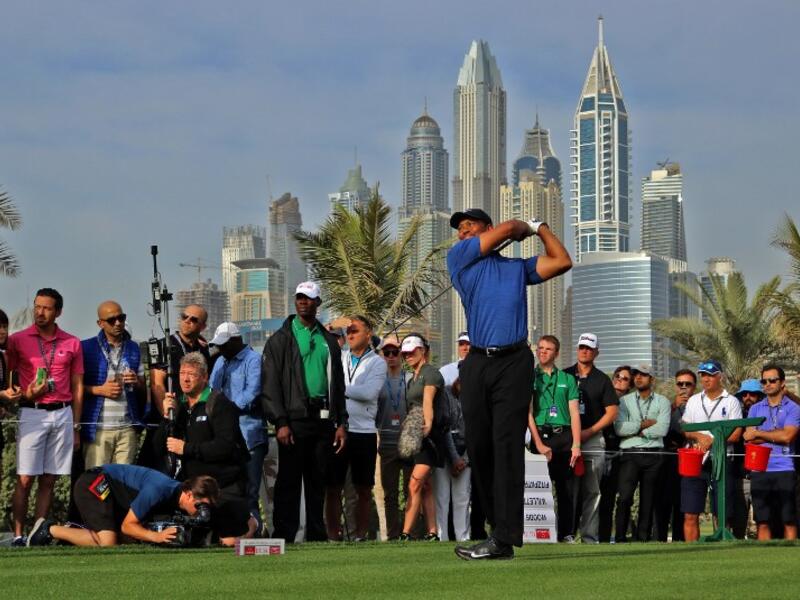 Tiger Woods of the United States follows his ball after playing a shot during the Dubai Desert Classic golf tournament at the Emirates Golf Club in Dubai on February 2, 2017.
NEZAR BALOUT / AFP