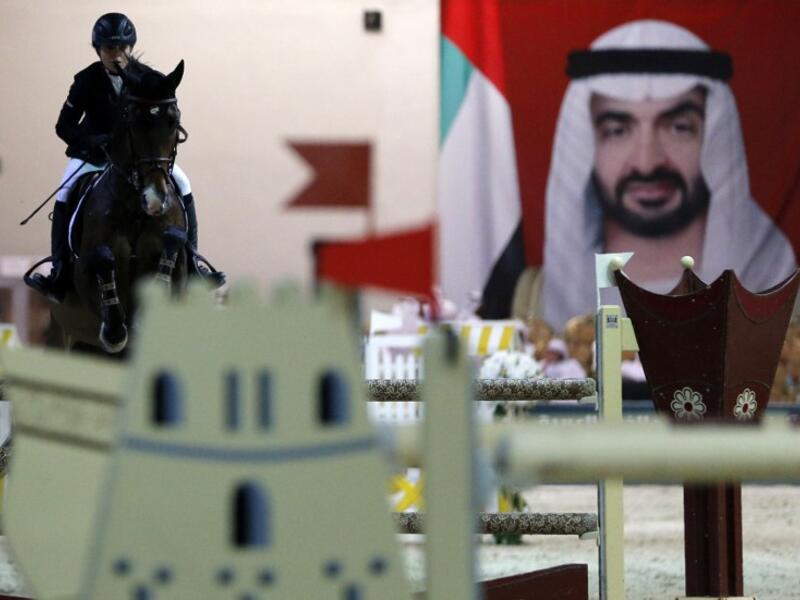 Emirati horserider Nadia Abdul Aziz Taryam competes during the Sheikh Sultan Bin Zayed Al Nahyan Showjumping Championship in Bou Thib, south of Abu Dhabi on March 5, 2016.
KARIM SAHIB / AFP