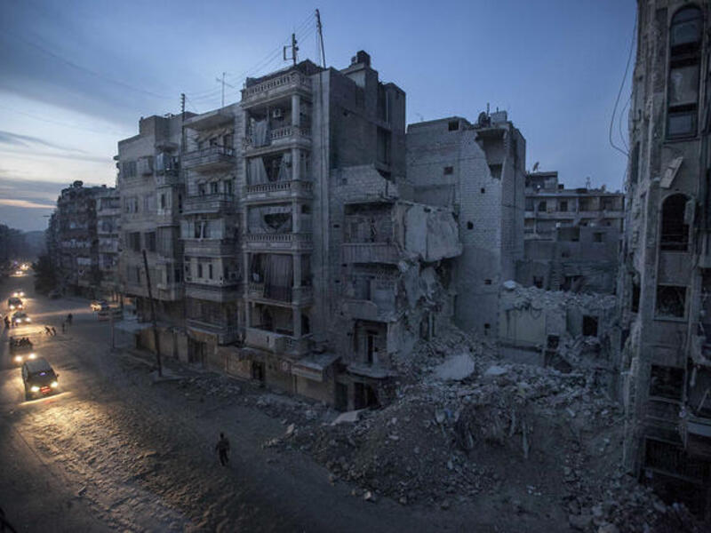 Syrian street during one of many power outages caused by war torn infrastructure failures. [washingtonpost]
