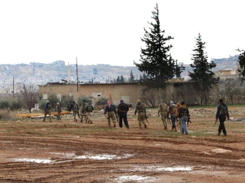 A large number of civilians are forced to flee their homes every day as Turkish-backed militants make advances in the city. (AFP/File) 

