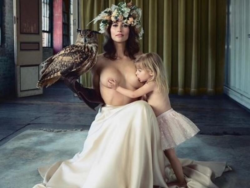 Reka has responded to the criticism by sharing photos of herself nursing her toddler, including this majestic shot of her sitting on a chair with an owl perched on her arm (Instagram)