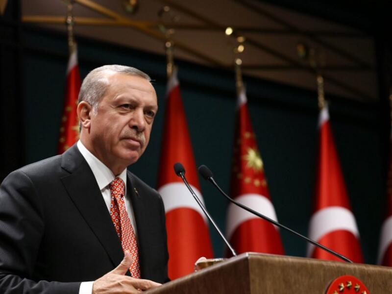 Turkish President Recep Tayyip Erdogan addresses people demonstrating against the military coup attempt in Turkey in Ankara, Turkey on July 24, 2016. (AFP/Yasin Bulbul)
