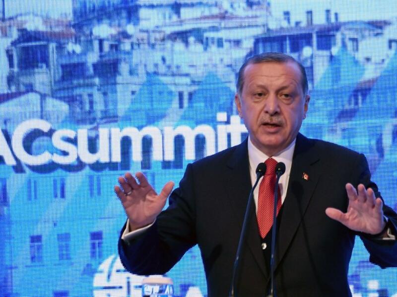 Turkish President Recep Tayyip Erdogan gestures as he gives a speech on April 28, 2017 during the Atlantic Council summit in Istanbul. (AFP/Ozan Kose)