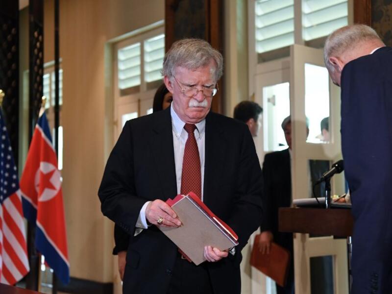US National Security Advisor John Bolton arrives for a signing ceremony between North Korea's leader Kim Jong Un and US President Donald Trump during their historic US-North Korea summit, at the Capella Hotel on Sentosa island in Singapore on June 12, 2018. (SAUL LOEB / AFP)
