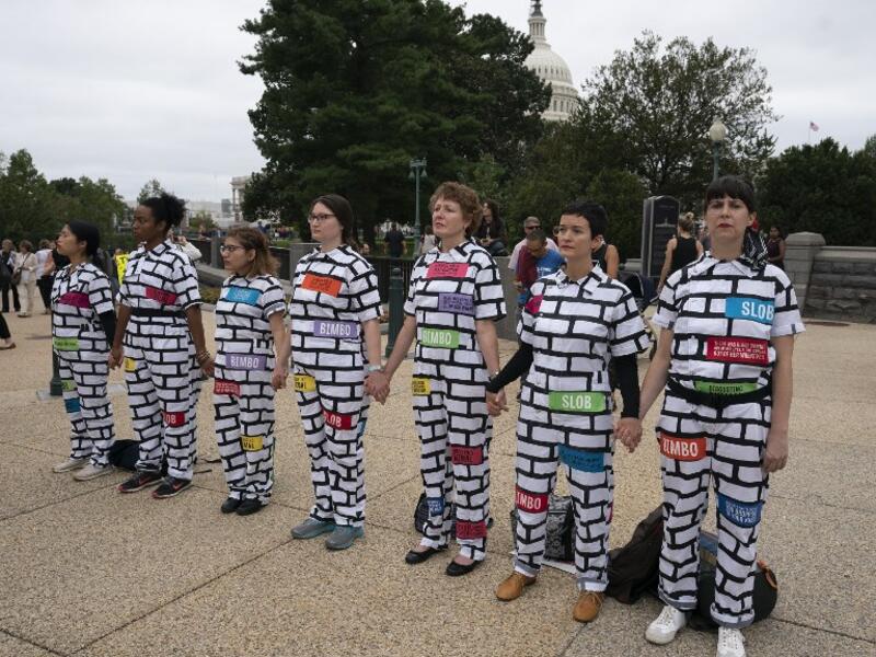 Protesters demonstrate in opposition to the Senate confirmation of Brett Kavanaugh to The Supreme Court in Washington DC, October 6, 2018. (CHRIS KLEPONIS / AFP)




