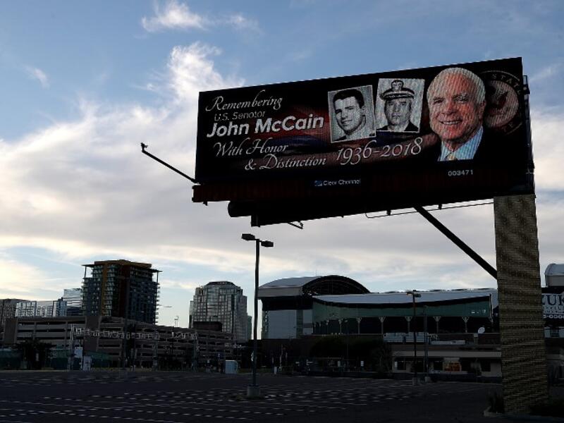 A message honoring U.S. Sen. John McCain (R-AZ) is displayed on a billboard on August 27, 2018 in Phoenix, Arizona. (AFP)