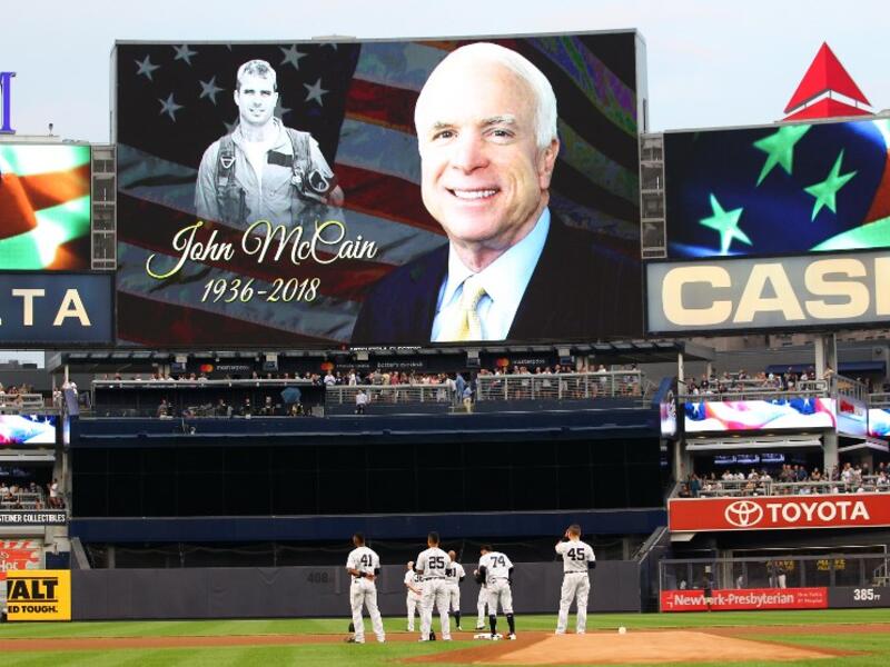 Senator John McCain is remembered during a moment of silence before the start of a baseball game between the Chicago White Sox and the New York Yankees at Yankee Stadium on August 27, 2018 in the Bronx borough of New York City. (AFP)