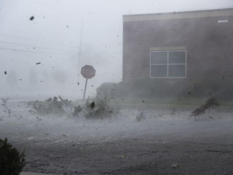 Debris is blown down a street by Hurricane Michael on October 10, 2018 in Panama City, Florida. (Joe Raedle/Getty Images/AFP )