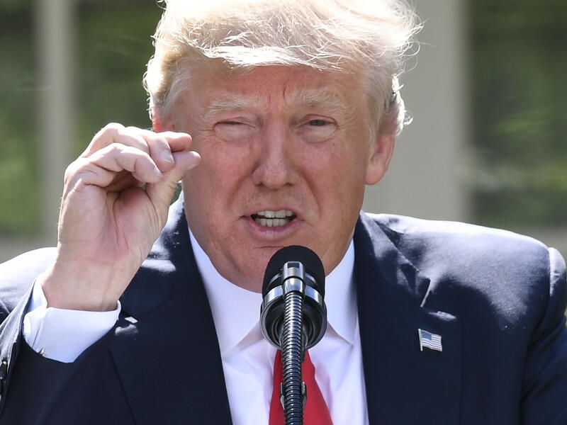 Around a quarter of residents in the Kingdom questioned by YouGov said the visit positively affected their impression of Trump, compared to 38 percent who said the visit made no difference. (AFP)
