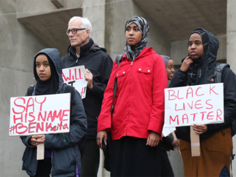 Students and activists hold a vigil for Ben Keita, who was found hanged in a tree in January. (Twitter)