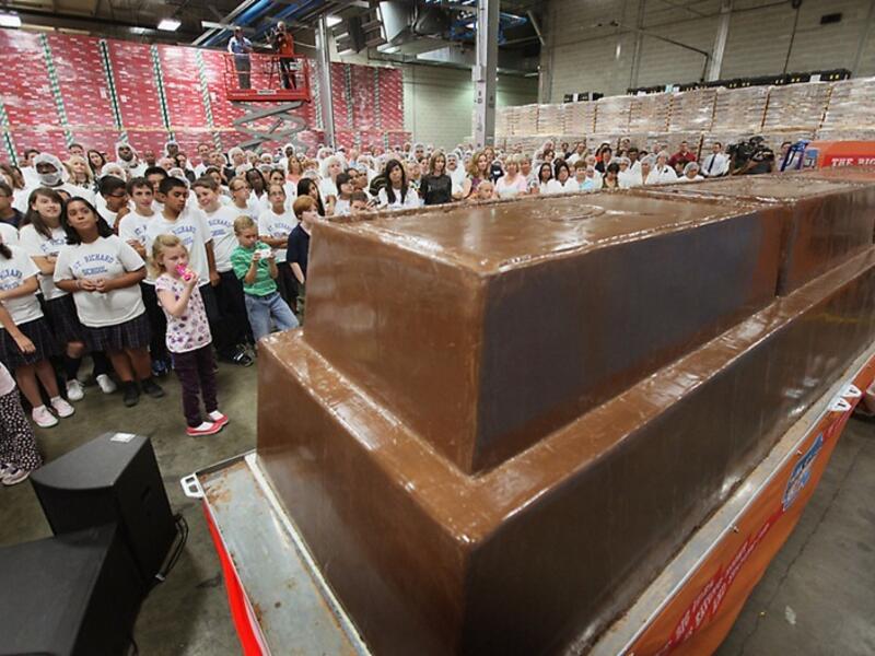 The bar, which stands nearly 3 feet high and measures 21 feet long, weighs 12,290 pound beating the previous record chocolate bar by more than a ton. (amusingplanet.com)