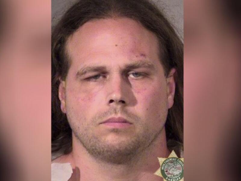 Police charged Jeremy Christian with stabbing and killing two men and injuring a third. (AFP/File)
