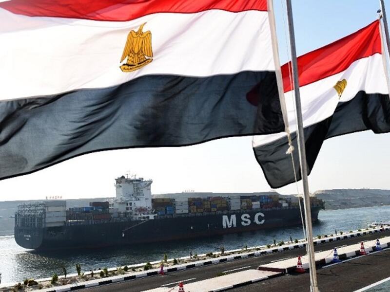 Egypt said it will launch a petrochemical complex, an oil refinery, an industrial complex for solar cells and another for wind turbines, as well as factories for textiles, foodstuffs, electrical appliances and motorcycles. (AFP/ Mohamed El-Shahed)
