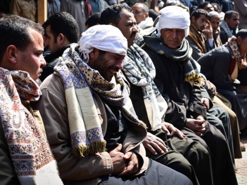 Relatives of Egyptian Coptic Christians purportedly murdered by Daesh in Libya react after hearing the news on February 16, 2015 in the village of al-Awar in Egypt's southern province of Minya. (AFP/Mohamed El-Shahed)