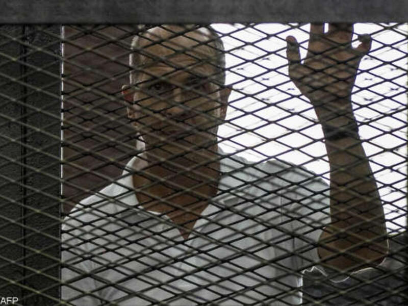 Egypt's three year sentences for the Al Jazeera journalists sparked international outrage this week, prompting the reemergence of #FreeAJStaff. (AFP/File)