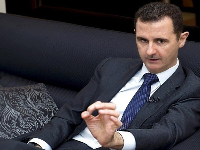 The embattled Syrian president also said he believed he still held popular support among his people, and brushed off recent claims by rights groups and rebels that his regime had launched a chemical attack on rebel-held areas of Idlib earlier this month, which monitors say killed a family of six including three children. (AFP/File)