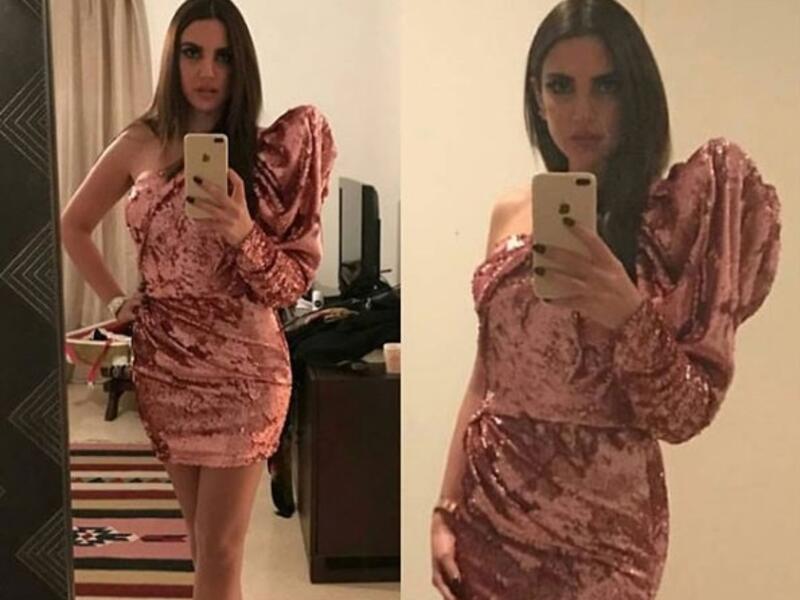 الفنانة التونسية درة بإطلالة مثيرة مرتدية فستان قصير جداً ذو كتف واحد، وأسدلت شعرها الأسود بشكل بدت معه أكثر جرأة