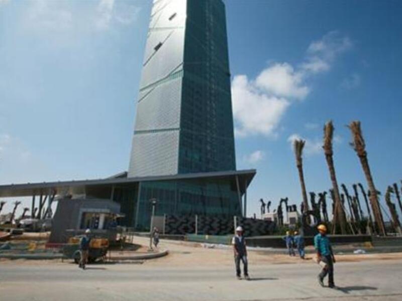 Foreign laborers at the construction site of a new tower overlooking the sea at the commercial center of Tripoli
By: Jamie Dettmer