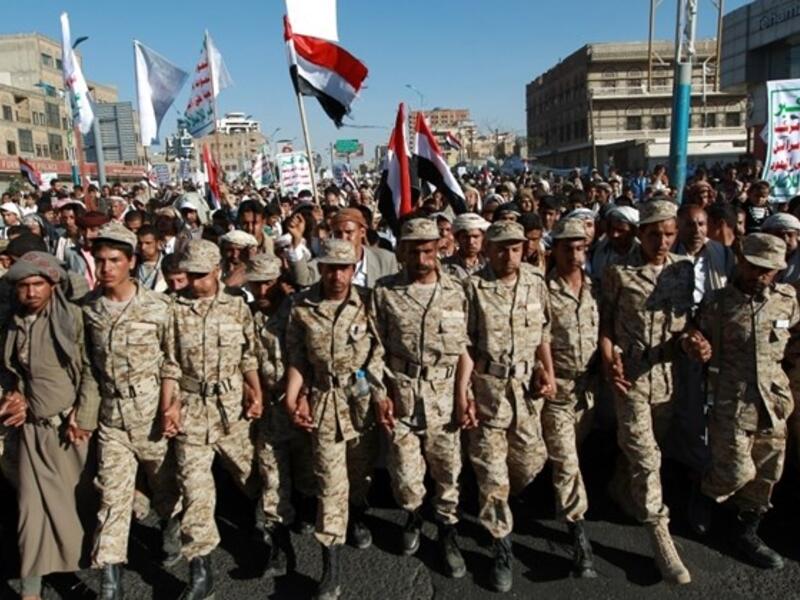 Houthi fighters marched in a demonstration in Sana'a in February. (AFP/File)