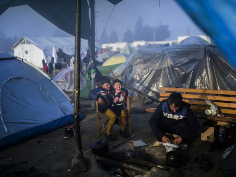 Refugee children are seen at a makeshift camp near the village of Idomeni not far from the Greek-Macedonian border. (AFP/File)