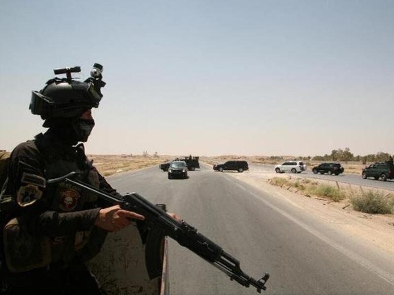 An Iraqi soldier stands guard near Ramadi. (AFP/Azhar Shallal)