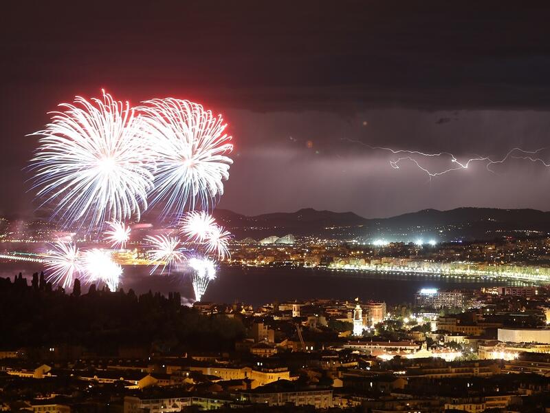 Revelers had been watching the annual Bastille Day fireworks display, which this year was accompanied by lightning, when the attacker struck.
 (AFP / Valery Hache)