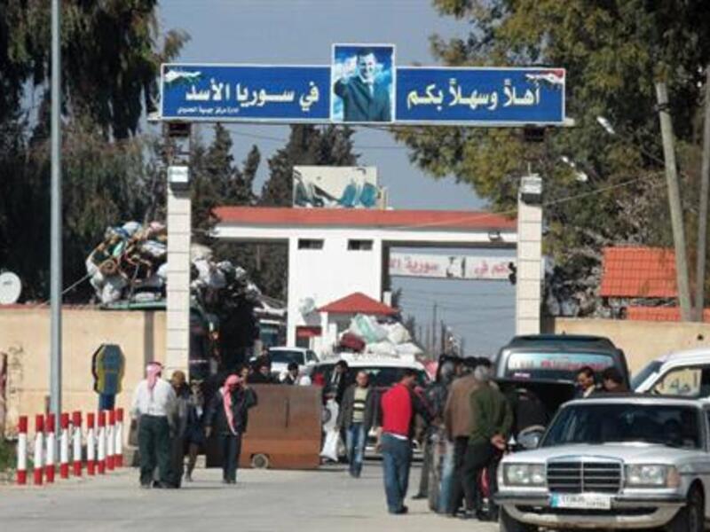 Syrians crossing into Lebanon on March 22 (Daily Star/ Nidal Solh)