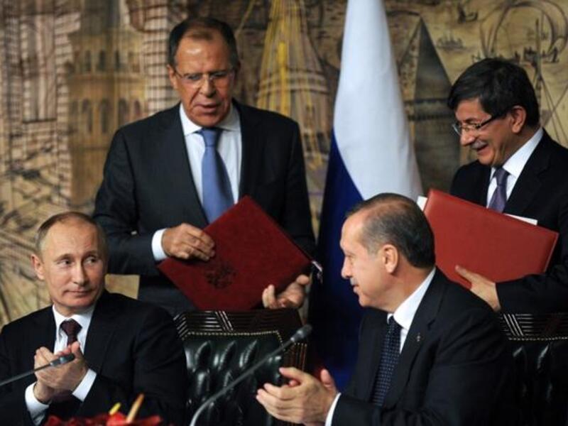 From left: Russian President Viladimir Putin, Russian Foreign Minister Sergei Lavrov, Turkish Prime Minister Recep Tayyip Erdogan and Turkish Foreign Minister Ahmet Davutoglu. Putin met Erdogan for talks covering their opposing views on Syria. (AFP PHOTO/BULENT KILIC)