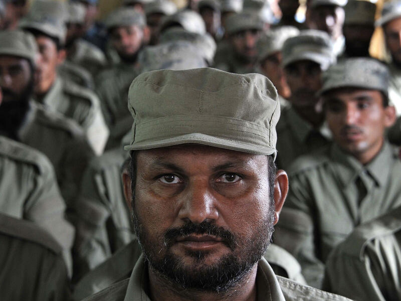 Cadets from the Afghan Local Police (ALP) look on during their graduation ceremony at a police training centre on the outskirts of Jalalabad on July 17, 2013. (Source: AFP/Noorullah Shirzada)