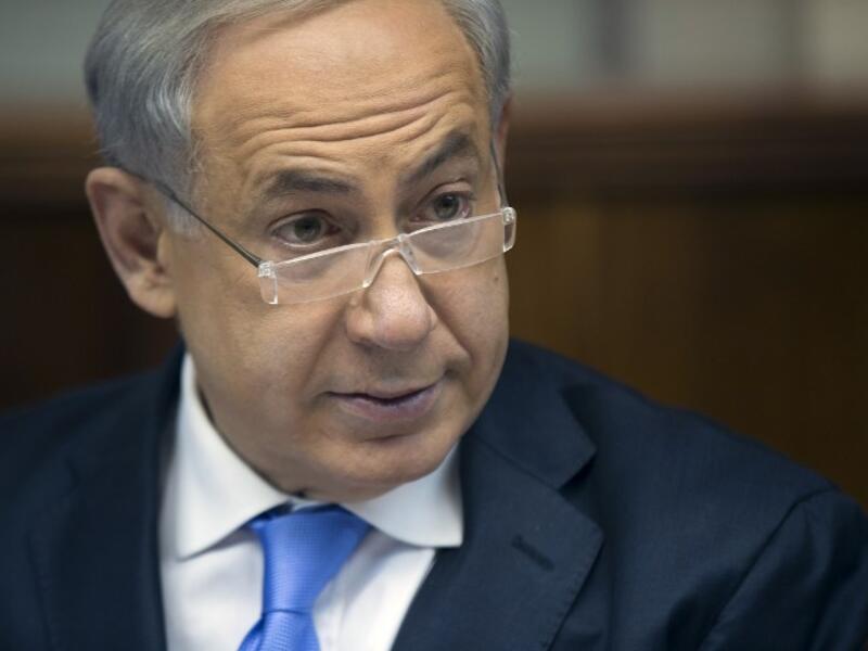 Israeli PM Benjamin Netanyahu's commentary Tuesday may further distance Israel and Palestinian delegations from reaching agreement to extend peace talks past April deadline (File Archive/AFP)