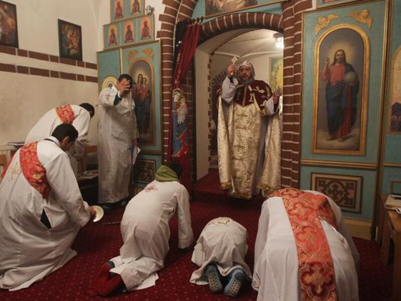 Copts are on their knees praying for protection under a Brotherhood President