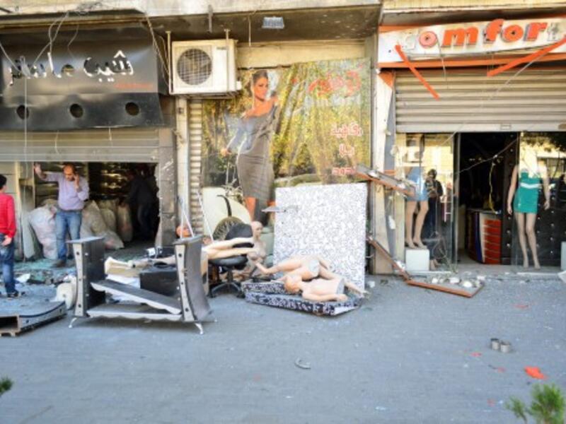 A SANA handout picture shows the devastation in the Christian suburb of Qassaa in Damascus after mortar rounds killed eight people in the capital on Sunday. (AFP/SANA)